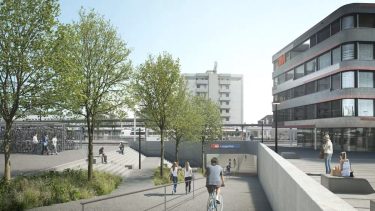 Der neue Zugang Nord zur neuen Bahnhofpassage. Links ist die oberirdische Veloabstellanlage zu sehen. Zwischen der Veloabstellanlage und dem Portal der Passage ist – leicht verdeckt von den Baumkronen – in Weiss der künftige Lift ersichtlich. (Visualisierung: SBB)